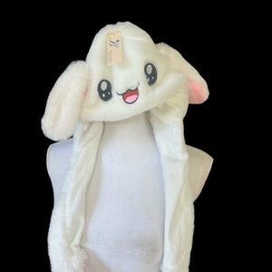 Bunny hat, new with tags super cute when you press the pause the ears go up